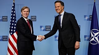 NATO Secretary General Mark Rutte, right, and US Undersecretary of Defense for Policy Elbridge Colby prior to a meeting of NATO defense ministers in Brussels on 12 Feb 2026.