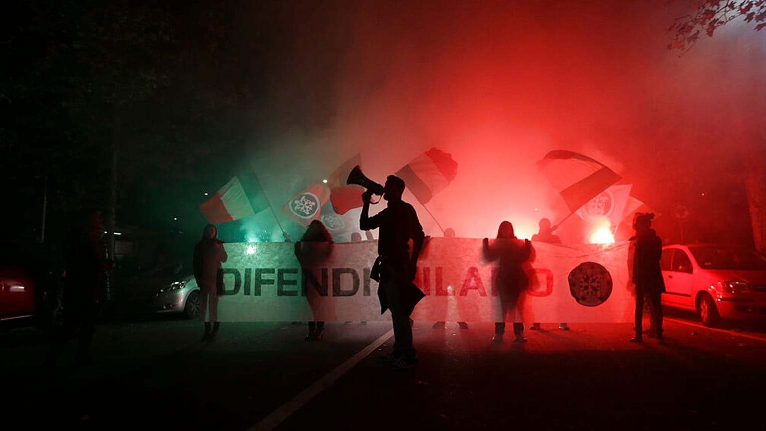 FILE: CasaPound activists demonstrate outside the former Montello barracks, where migrants are being transferred by Milan's prefecture, in Milan, 31 October 2016