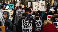 People participate in an anti-ICE protest outside of the Governors Residence in St Paul, 6 February, 2026