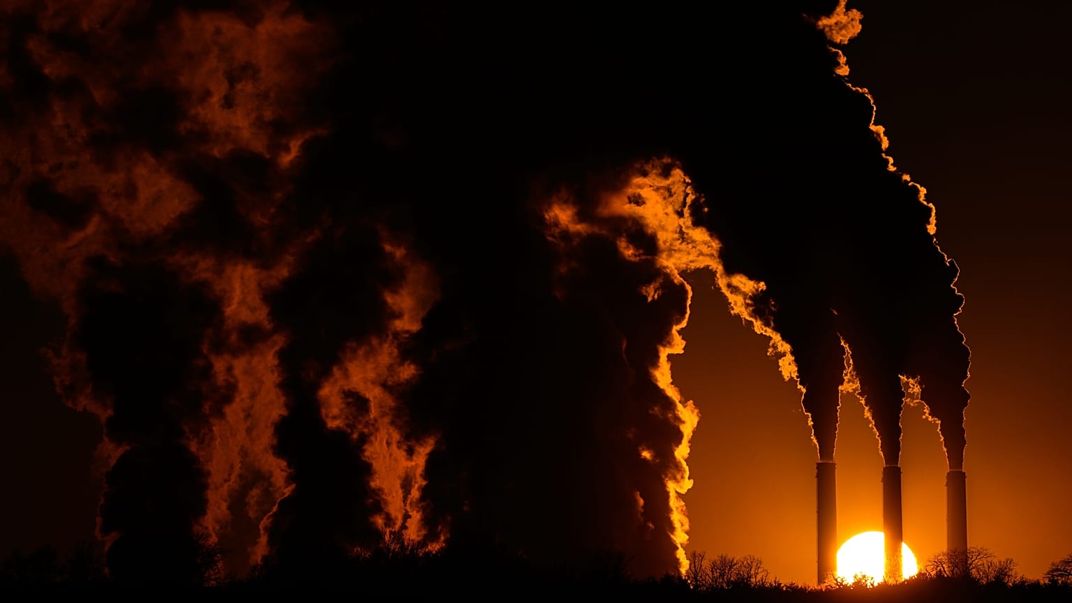 The Jeffrey Energy Center coal-fired power plant operates at sunset near Emmett, Kan., 3 Jan 2026, in Topeka, Kan.