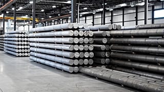 FILE. Aluminum billet awaits processing and extrusion at Magna Aluminum Profile's fully electric extrusion facility in Salaberry-de-Valleyfield, Quebec, 3 Sept. 2025.
