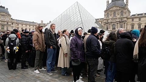 A queue at the entrance to the Pyramid, while some of the museum's rooms are closed, on 13 February 2026.