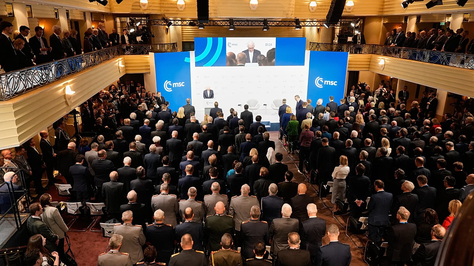 Attendees observe a moment of silence at the Munich Security Conference in Munich, Germany, Saturday, Feb. 14, 2026.