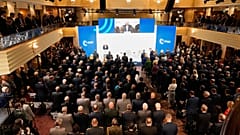Attendees observe a moment of silence at the Munich Security Conference in Munich, Germany, Saturday, Feb. 14, 2026.