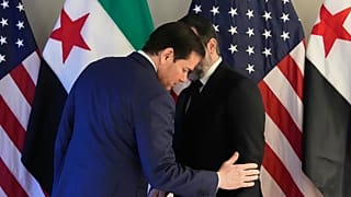 U.S. Secretary of State Marco Rubio, left, and Syrian Foreign Minister Asaad al-Shibani meet in Munich, Germany, Friday, Feb. 13, 2026.