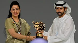 Indian teacher Rouble Nagi, left, receives the Global Teacher Prize award from Dubai Crown Prince Sheikh Hamdan bin Mohammed Al Maktoum in United Arab Emirates, 5 Feb 2026