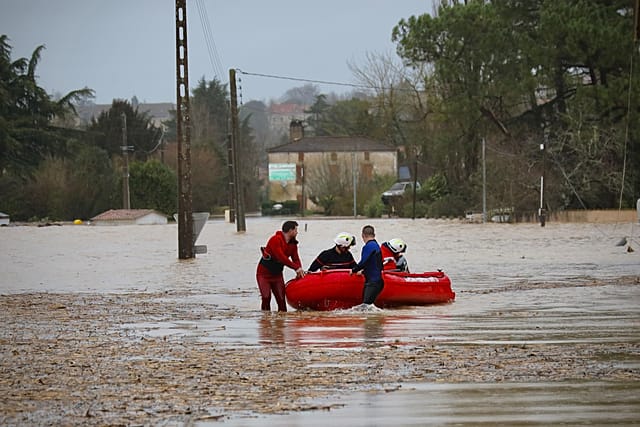 France on record flood alert as storms slam Spain with deadly winds ...