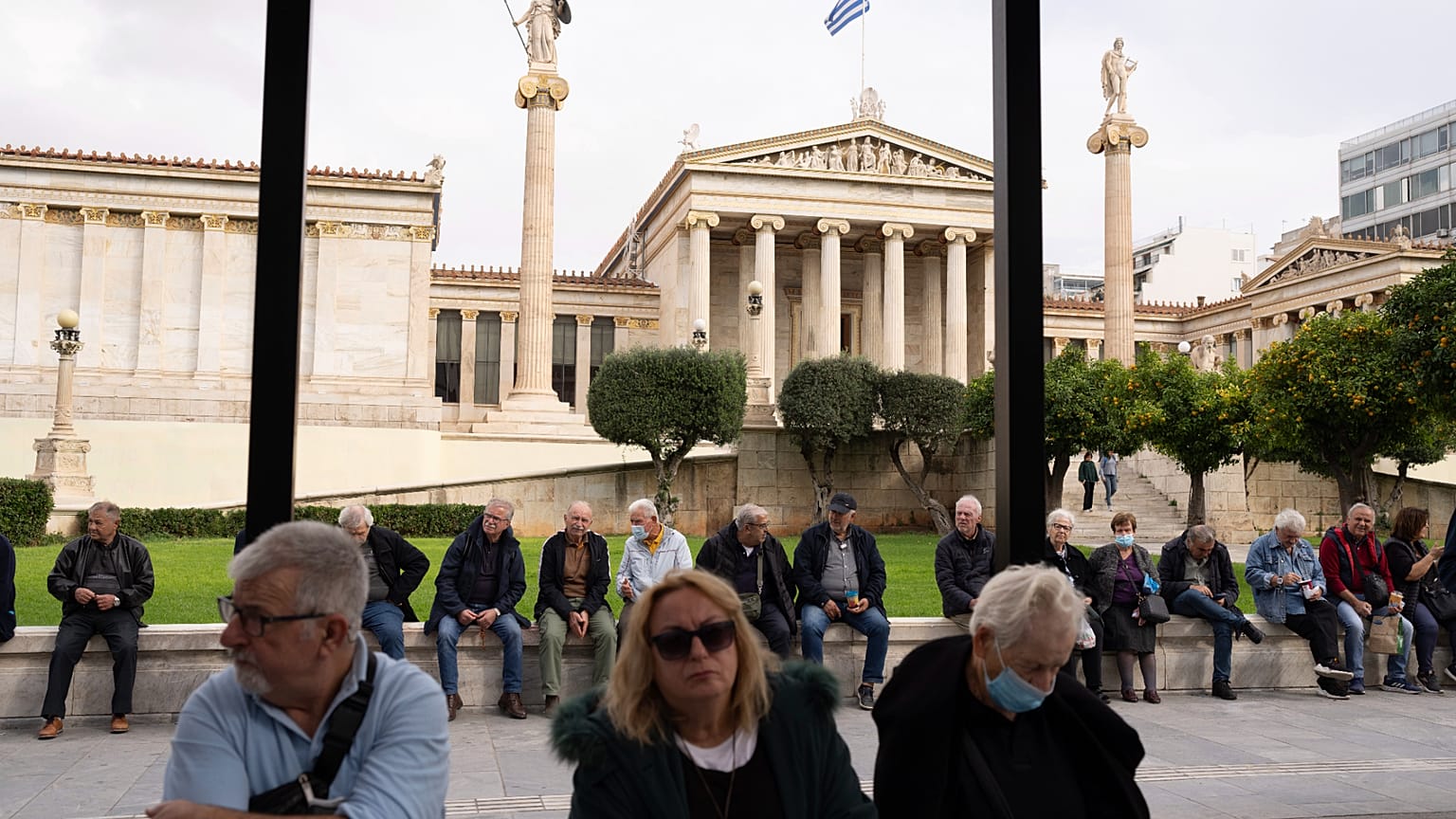 Pensioners gather to protest in front of the Athens Academy, on Friday, Nov. 24, 2023