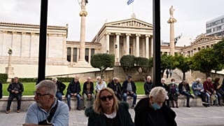 Pensioners gather to protest in front of the Athens Academy, on Friday, Nov. 24, 2023