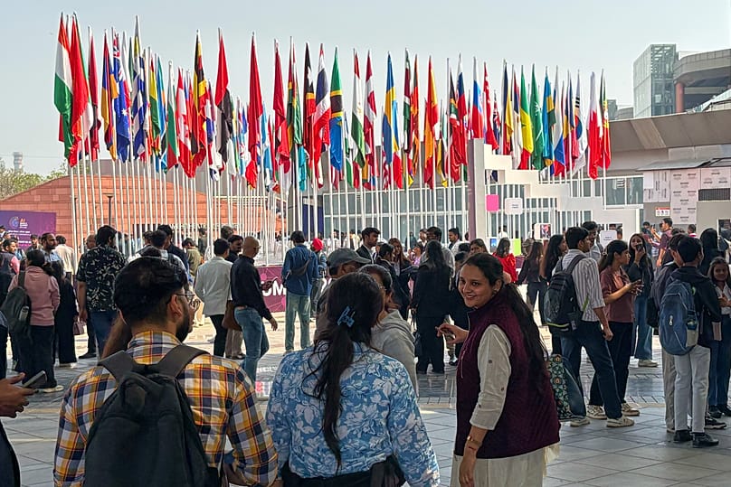 Delegates arrive for an AI-Summit in New Delhi, India, Monday, Feb. 16, 2026