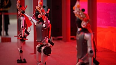 Humanoid robots perform during the media preview of a robotic temple fair celebrated ahead of Lunar New Year, 13 February 2026. 