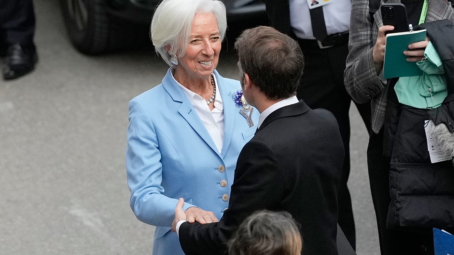French President Emmanuel Macron greets President of the ECB Christine Lagarde at the Munich Security Conference, Germany, Feb. 13, 2026