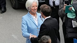 French President Emmanuel Macron greets President of the ECB Christine Lagarde at the Munich Security Conference, Germany, Feb. 13, 2026