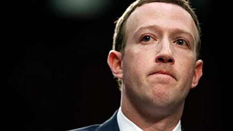 File - Facebook CEO Mark Zuckerberg pauses while speaking as he testifies before a joint hearing of the Commerce and Judiciary Committees on Capitol Hill in Washington 2018