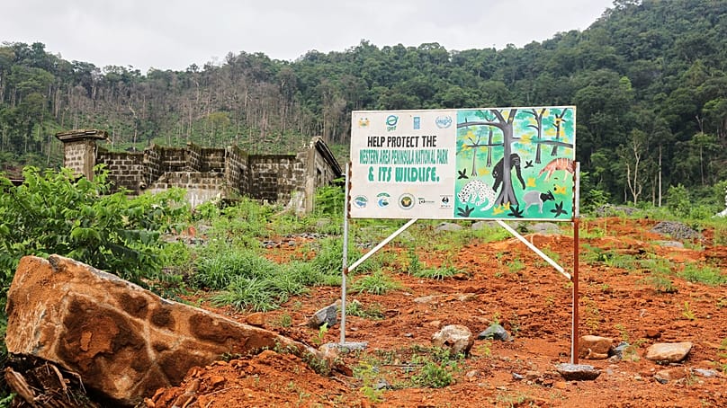 A sign urging protection of the Western Area Peninsula National Park, Sierra Leone, Saturday, July 5, 2025. 