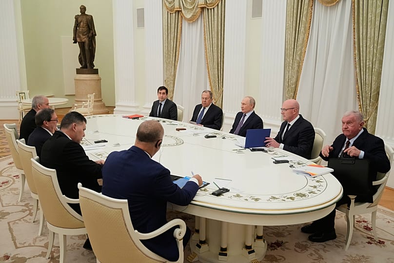 Russian President Vladimir Putin, third right, and Cuban Foreign Minister Bruno Rodriguez Parrilla, third left, attend the talks at the Senate Palace of the Kremlin in Moscow,