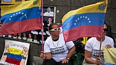 People of detained family members who are political prisoners protest for their releases outside the United Nations office in Caracas, 18 February 2026