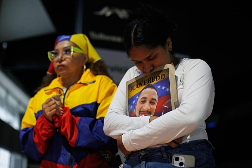 Relatives of detainees they say are held for political reasons wait outside El Helicoide, headquarters of Venezuela's intelligence service and a detention center.