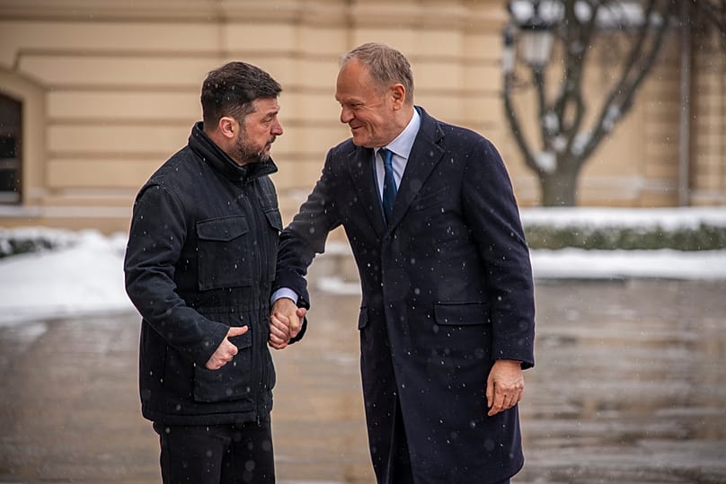 Ukrainian President Volodymyr Zelenskyy, left, and Polish Prime Minister Donald Tusk talk during their meeting in Kyiv, Ukraine, Feb. 5, 2026