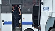 ARŞİV: Türk çevik kuvvet polisleri, 12 Haziran 2013 Çarşamba günü İstanbul, Taksim Meydanı'nda bir otobüsün içinde duruyor.