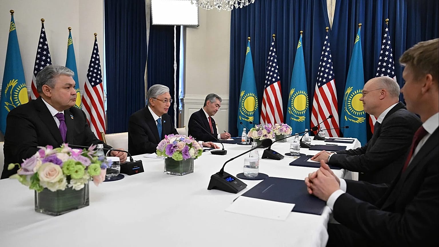 Tokayev at a meeting