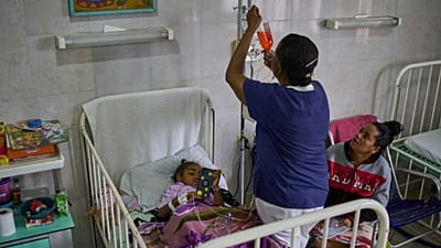 Carolina Silva Matos, a cancer patient, rests in a hospital bed at the National Institute of Oncology and Radiology in Havana, Cuba, Friday, Feb. 20, 2026