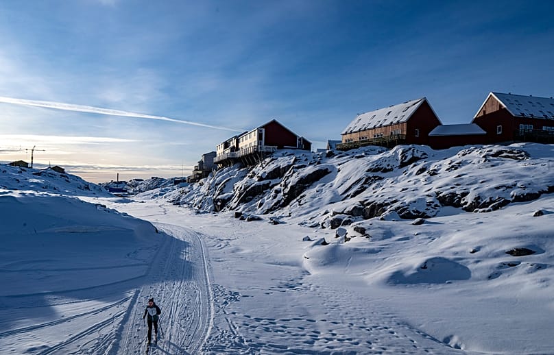 A person skis in Nuuk, 6 February, 2026
