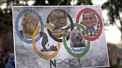 Plakat mit Karikaturen von US-Präsident Donald Trump und Israels Premierminister Benjamin Netanjahu