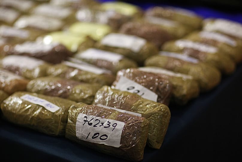 Seized packages of ammunition, allegedly seized from suspect Erick Valencia Salazar, alias "El 85" not in the picture, sit on display in Mexico City, 12 March 2012