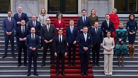 Members of new Dutch minority coalition party pose with King Willem-Alexander on the steps of Royal Palace Huis ten Bosch in The Hague, Netherlands, Monday, Feb. 23, 2026.