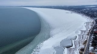 The Baltic Sea is frozen along the beach in Sierksdorf, northern Germany, Sunday, Feb. 8, 2026.