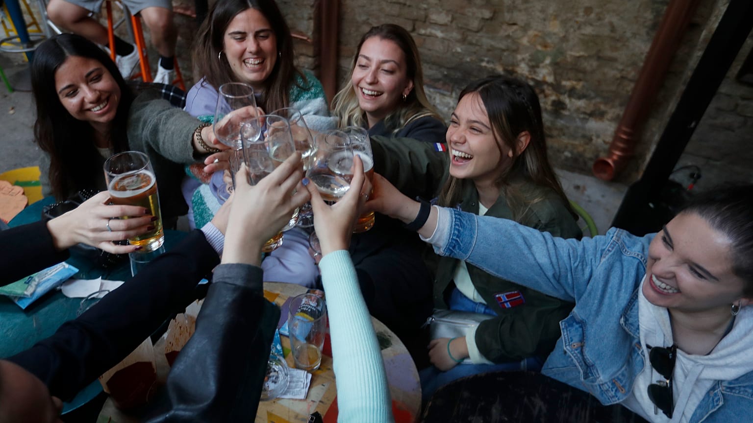 FILE: Women sit in the outside terrace of a bar in Budapest, Hungary.