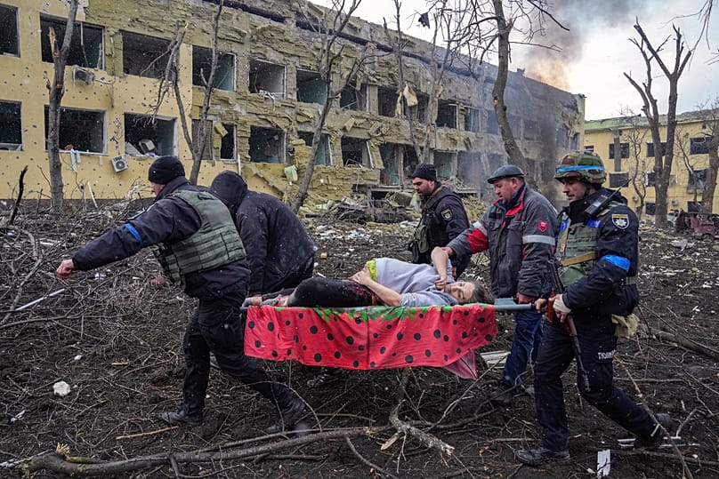 A pregnant woman who was severely wounded during Russian shelling is evacuated from a maternity hospital in Mariupol, Ukraine, March 9, 2022. The woman did not survive.