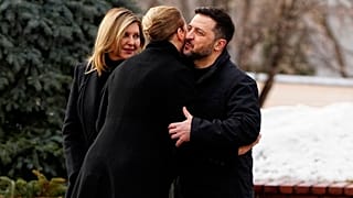 Denmark's Prime Minister Mette Frederiksen, centre, is welcomed by Ukraine's President Volodymyr Zelenskyy and his wife Olena Zelenska, in Kyiv, Ukraine, on 24 Feb. 2026.