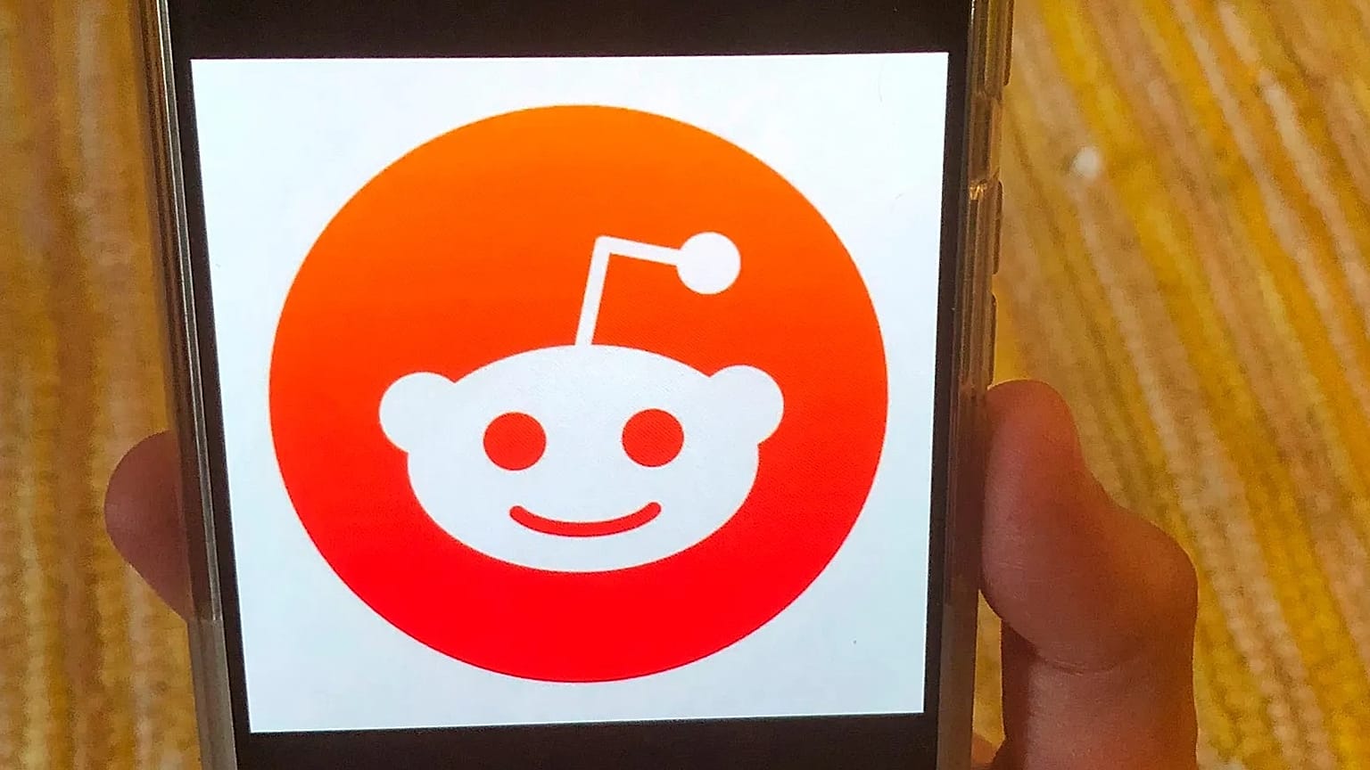 FILE - This June 29, 2020 file photo shows the Reddit logo on a mobile device in New York. 