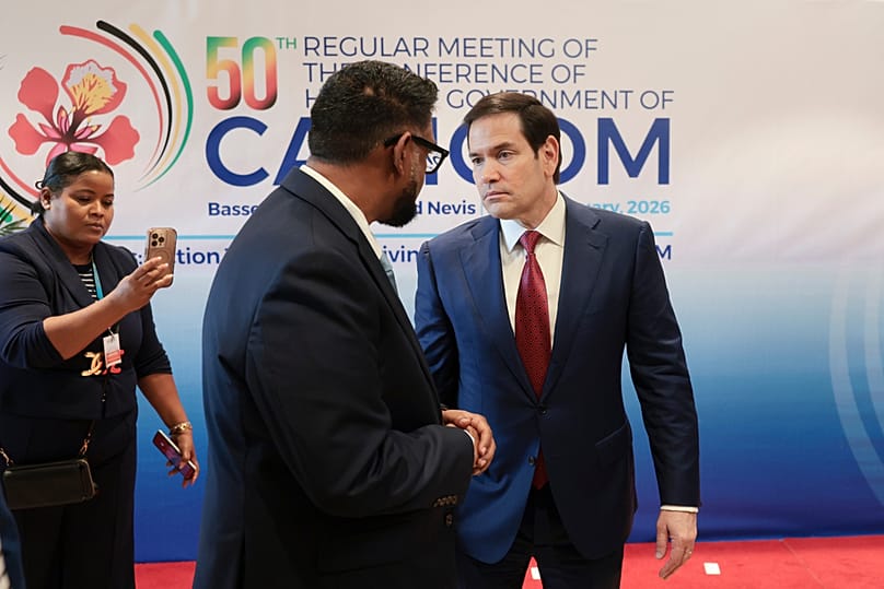 Marco Rubio shakes hands with Guyana's President Mohamed Irfaan Ali during the Caribbean Community (CARICOM) meeting in Basseterre, Saint Kitts and Nevis, Feb. 25, 2026