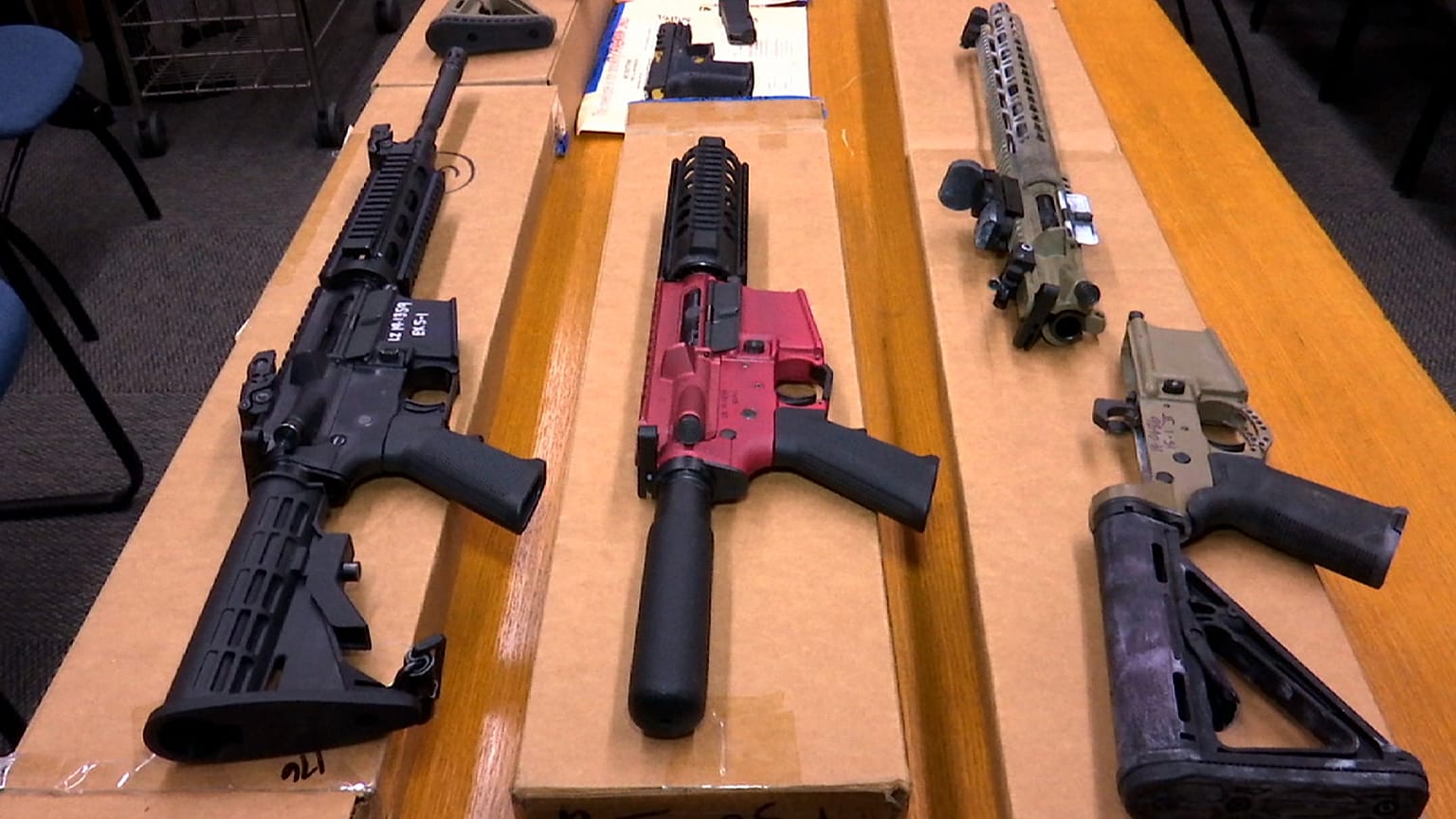 This Nov. 27, 2019, file photo shows 3D-printed, self-assembled "ghost guns" on display at the headquarters of the San Francisco Police Department.