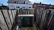 An air-to-water heat pump system is installed at a suburb new housing estate in Marl, Germany.