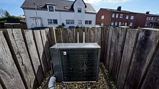 An air-to-water heat pump system is installed at a suburb new housing estate in Marl, Germany.