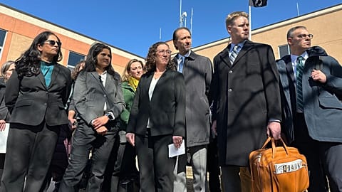 Leaders and attorneys for several Greenpeace entities listen to a reporter's question after a jury's verdict at the Morton County Courthouse in Mandan, N.D., March 19, 2025. 