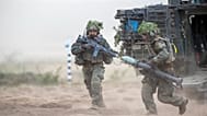 German soldiers take part in a Lithuanian-German division-level international military exercise in Pabrade, Lithuania, on 29 May 2024.
