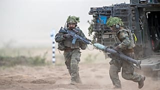 German soldiers take part in a Lithuanian-German division-level international military exercise in Pabrade, Lithuania, on 29 May 2024.