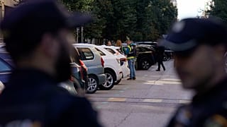 FILE: Police officers stand in an area following an incident in Madrid, 9 November 2023