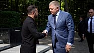  In this photo provided by the Ukrainian Presidential Press Office, Ukrainian President Volodymyr Zelenskyy, left, and Prime Minister of Slovakia Robert Fico shake hands in Uz