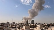 Smoke rises on the skyline after an explosion in Tehran, 28 February, 2026