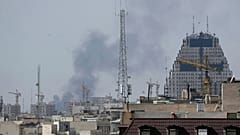 Smoke rises on the skyline after an explosion in Tehran, 28 February, 2026