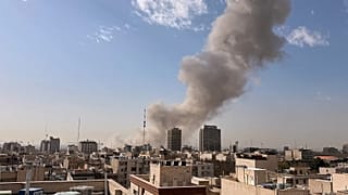 Smoke rises on the skyline after an explosion in Tehran, 28 February, 2026