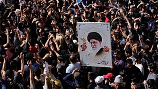 Shiite Muslims holds a photograph of Iran's Supreme Leader Ayatollah Ali Khamenei during a protest in Jammu, 1 March, 2026