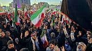 Government supporters gather in mourning after state TV officially announced the death of Iranian Supreme Leader Ayatollah Ali Khamenei, in Tehran, Iran, Sunday, March 1,
