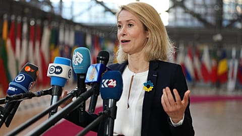 European Union foreign policy chief Kaja Kallas speaks with the media as she arrives for a meeting of EU foreign ministers at the European Council building in Brussels, Monday